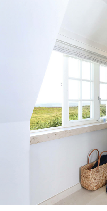 Badezimmer im Obergeschoss mit Blick auf das Naturschutzgebiet Morsumer Kliff